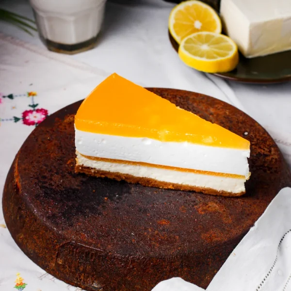 slice-lemon-cheesecake-placed-antique-iron-pan